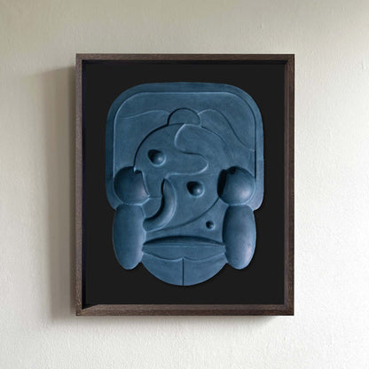 Mask 2, Relief artwork framed in Mahogany Stain with a black backboard